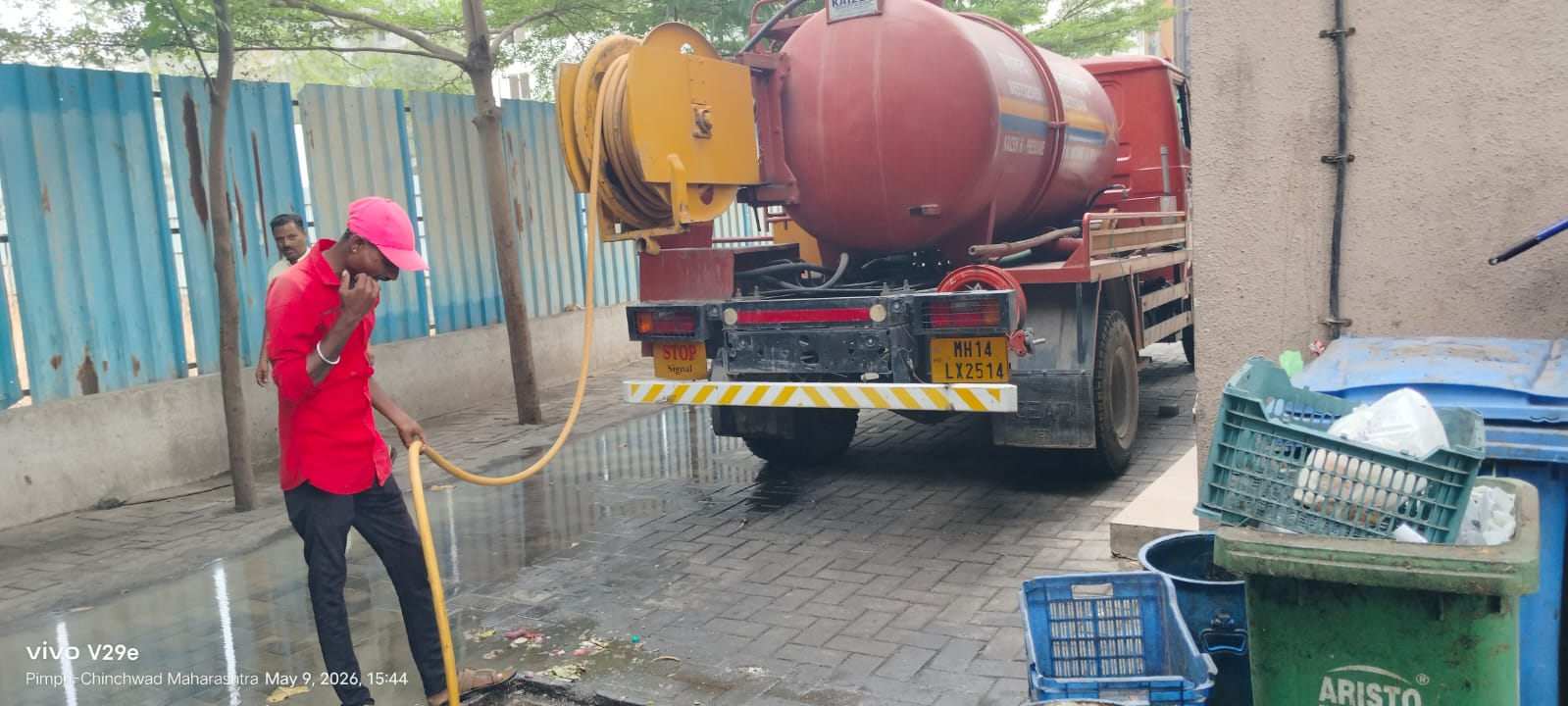 SHARAD orange vacuum tanker truck